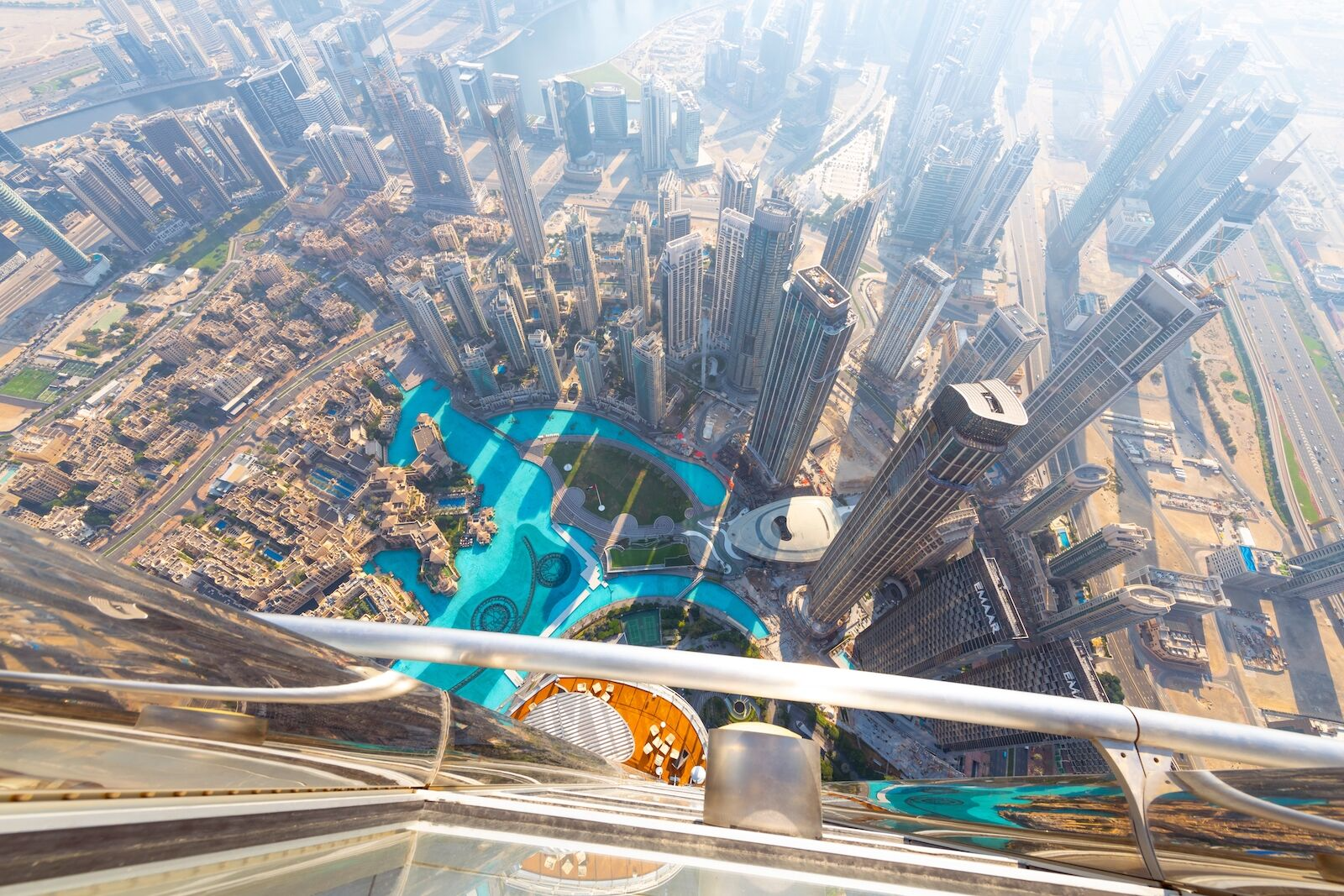 Aerial view down over Downtown Dubai and the Dubai Fountain from Burj Khalifa